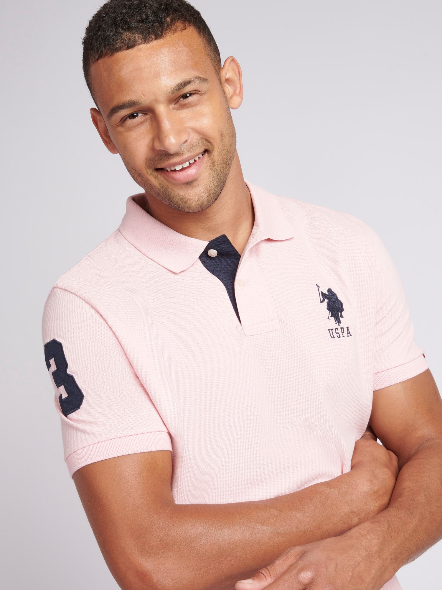 Pink polo shirt on sale