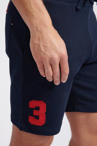 Mens Classic Fit Player 3 Sweat Shorts in Dark Sapphire Navy / Haute Red DHM