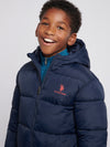 Boys Longline Puffer Jacket in Dark Sapphire Navy / Haute Red DHM