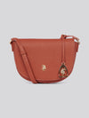 U.S. Polo Assn. Womens Jones Flap Crossbody Bag in Rust