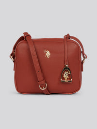 U.S. Polo Assn. Womens Jones Crossbody Bag in Rust